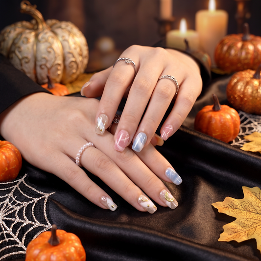 Woman wearing bold Leo Zodiac press-on nails with a Halloween-inspired fashion look.