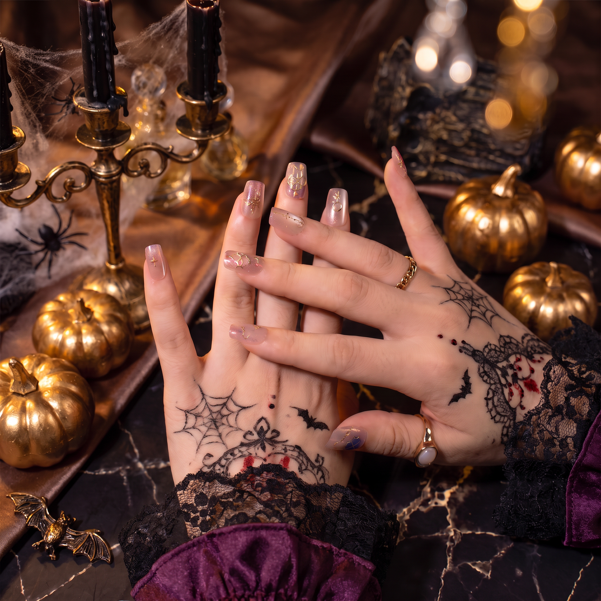 Woman wearing Sagittarius Zodiac press-on nails with a Halloween-inspired fall look.